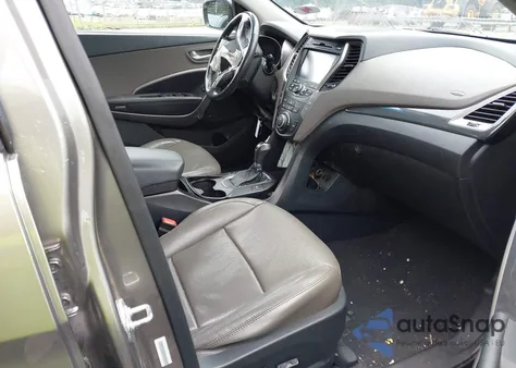 2015 Hyundai Santa Fe Sport 2.4L z USA, uszkodzony, nr VIN 5XYZUDLBXFG255449